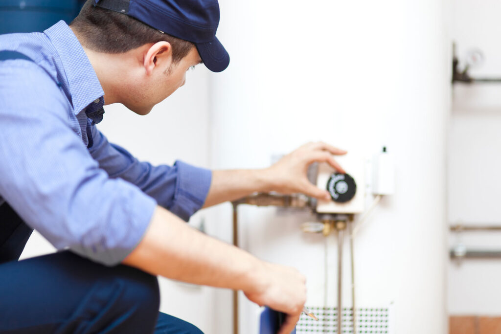 plumber repairing a water heater